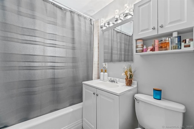 full bathroom featuring toilet, vanity, and shower / tub combo