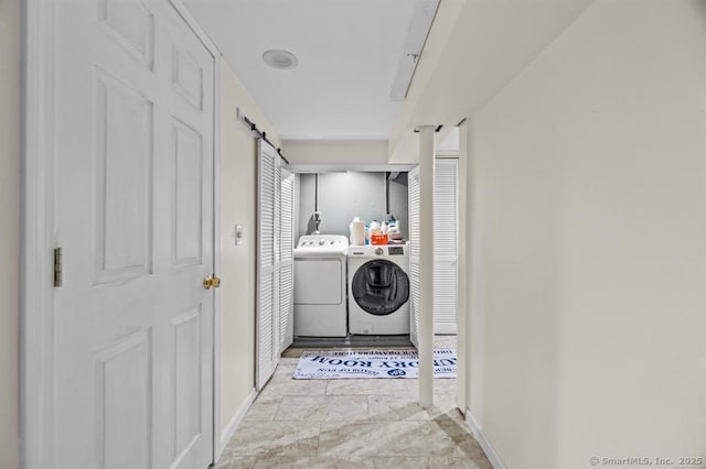 washroom with separate washer and dryer