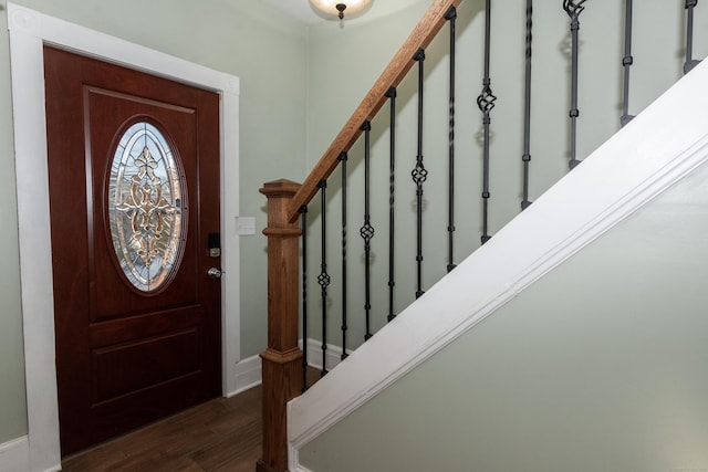 foyer with dark hardwood / wood-style flooring