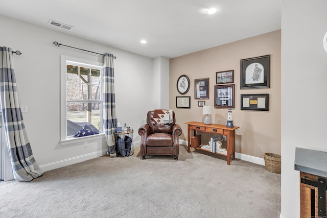 sitting room featuring carpet floors, baseboards, visible vents, and recessed lighting