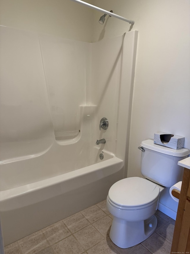 full bathroom featuring toilet, shower / bath combination, tile patterned floors, and vanity