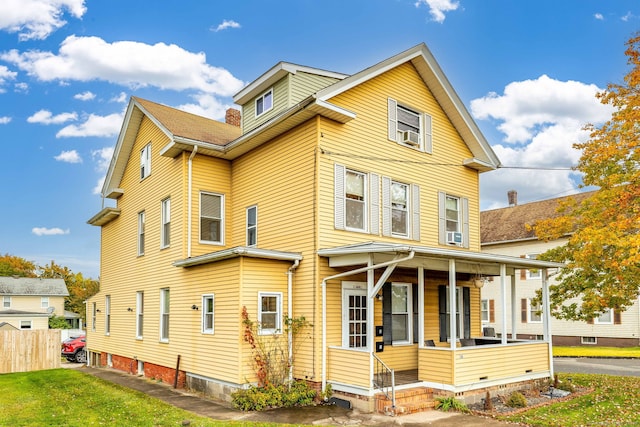 view of front of home featuring covered porch