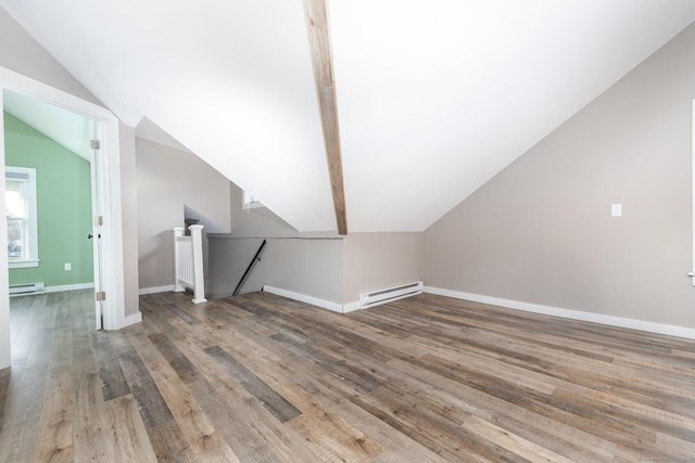 bonus room with vaulted ceiling, hardwood / wood-style floors, and a baseboard radiator