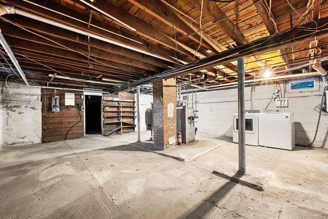 basement featuring washer and clothes dryer