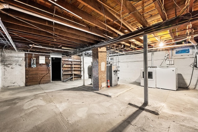 basement with washing machine and dryer