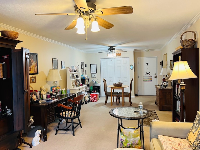 office featuring light carpet, ceiling fan, and crown molding