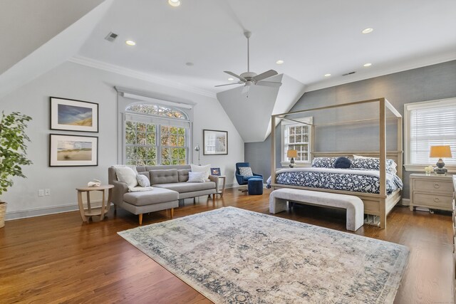 bedroom featuring ceiling fan, dark wood-type flooring, ornamental molding, and vaulted ceiling