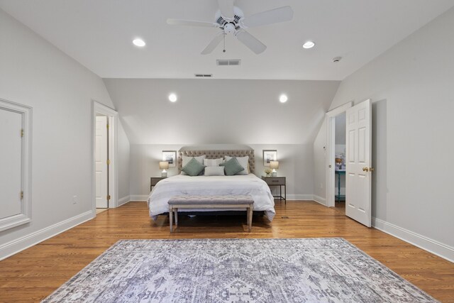 bedroom featuring vaulted ceiling, ceiling fan, and hardwood / wood-style flooring