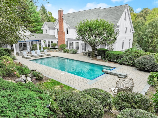 pool featuring a patio area