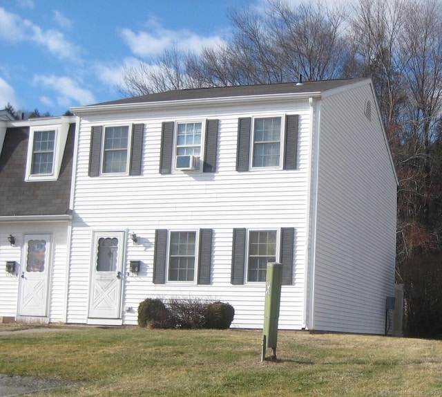 view of front facade with a front yard