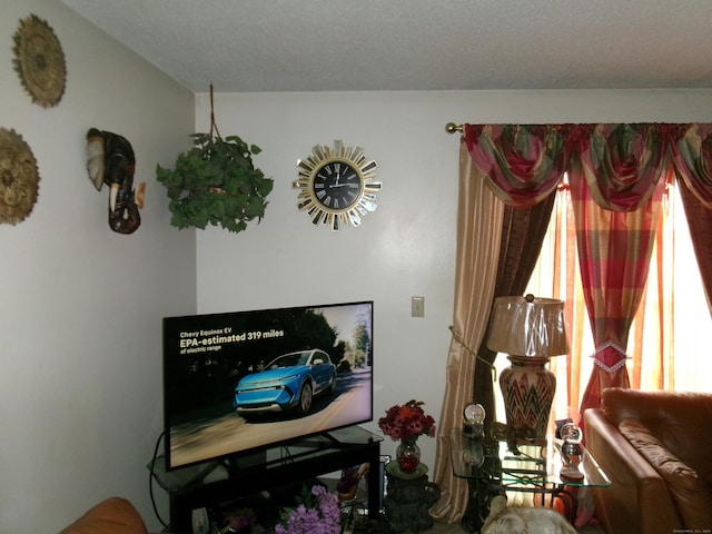 interior space featuring a textured ceiling