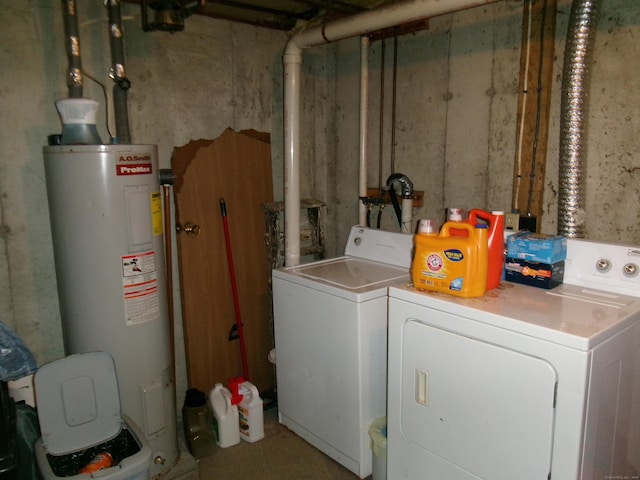 laundry area with independent washer and dryer and electric water heater