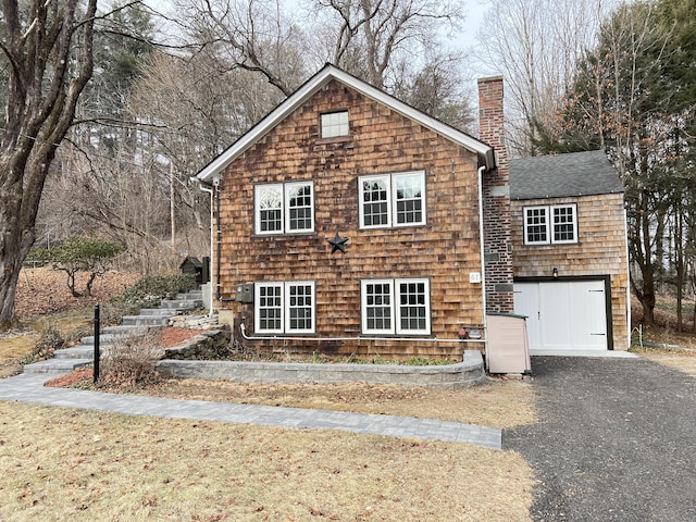 front facade with a garage