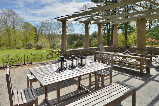 view of patio / terrace with outdoor dining area and a pergola