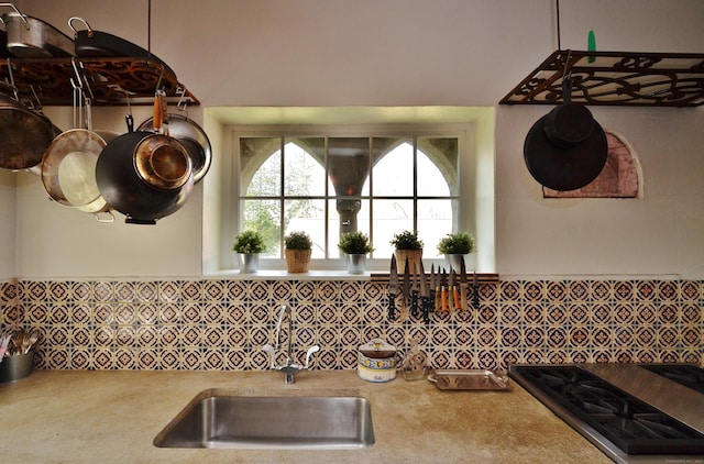 7 Old Depot Rd, Chester, CT 06412 - kitchen with stainless steel gas cooktop, decorative backsplash, and light countertops