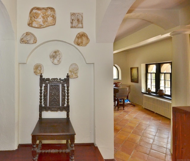 7 Old Depot Rd, Chester, CT 06412 - hall with radiator heating unit, arched walkways, and tile patterned flooring