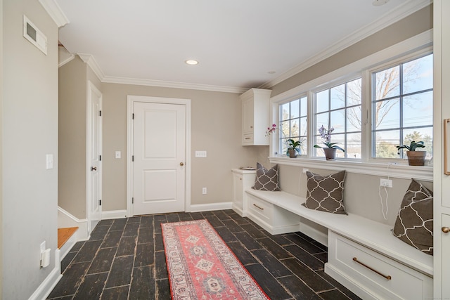 mudroom featuring ornamental molding