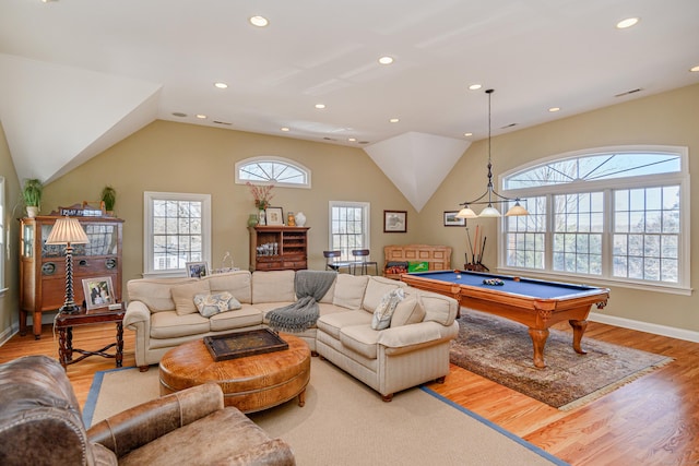 rec room with pool table and light hardwood / wood-style floors