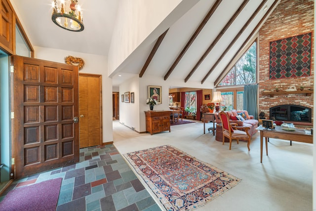 foyer with high vaulted ceiling, beamed ceiling, and a chandelier