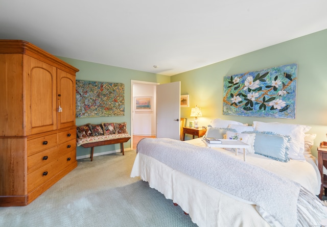 bedroom with light colored carpet