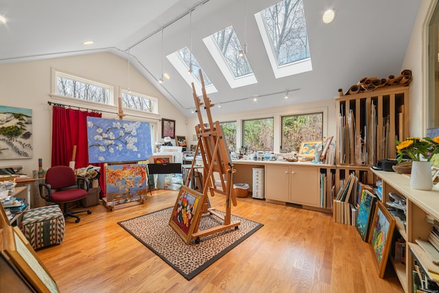 interior space featuring light wood-type flooring, wine cooler, and high vaulted ceiling