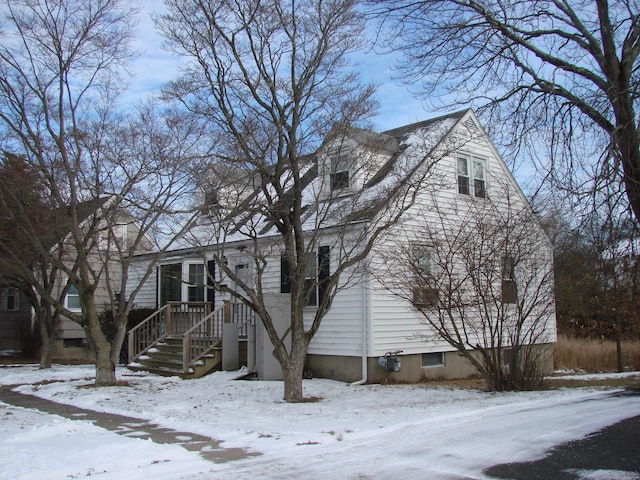 view of snow covered property