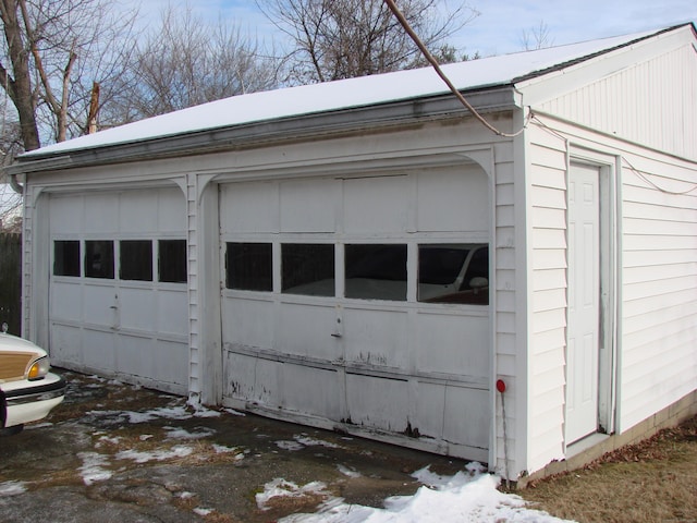 view of snow covered garage