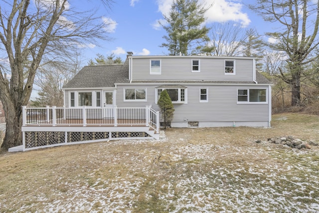 rear view of property with a deck