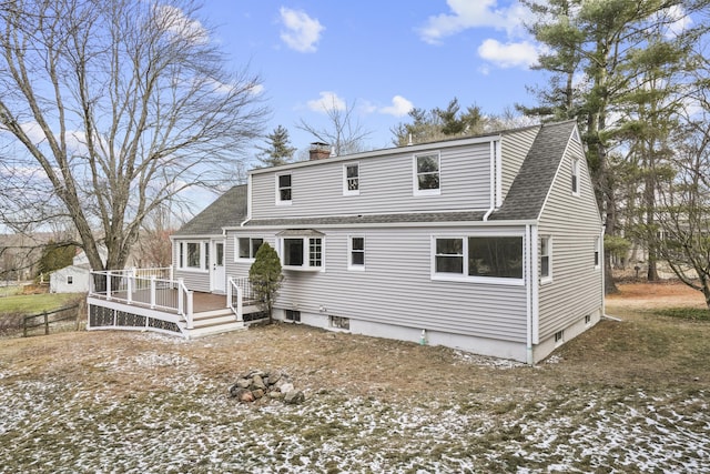 rear view of house with a deck