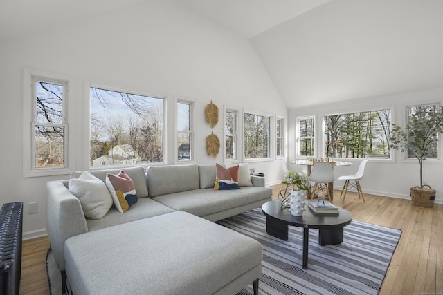 sunroom / solarium with vaulted ceiling