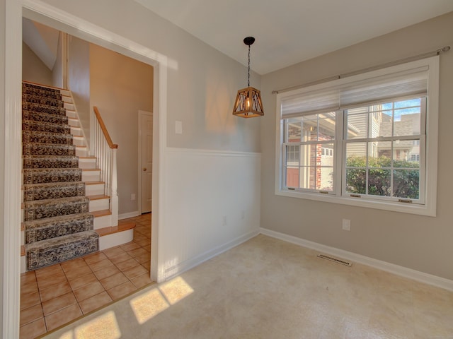 view of tiled spare room