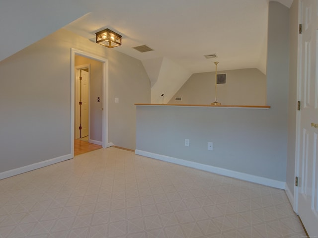 bonus room with vaulted ceiling