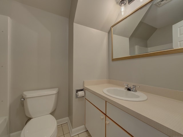 bathroom featuring toilet, tile patterned flooring, and vanity