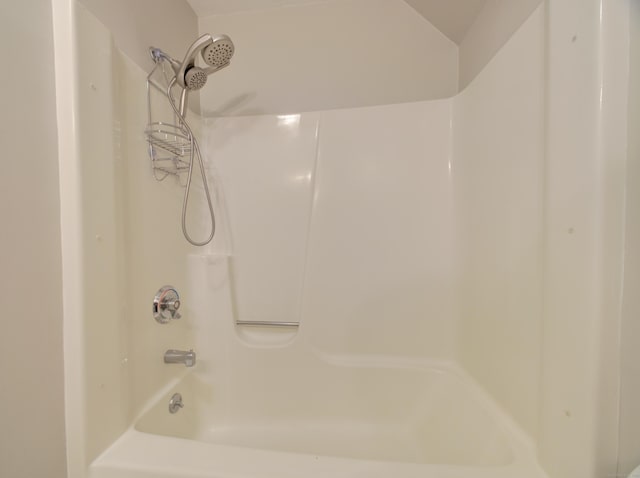 bathroom featuring washtub / shower combination