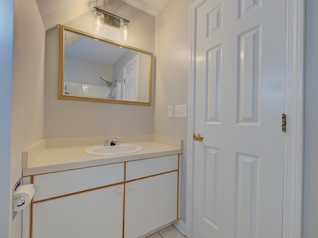 bathroom featuring tile patterned floors and vanity