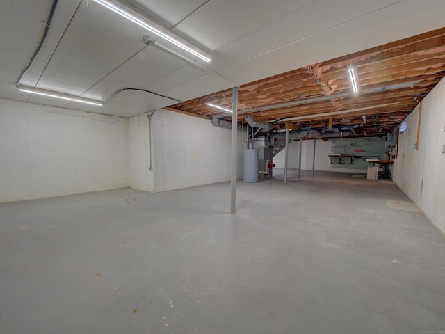 basement featuring water heater