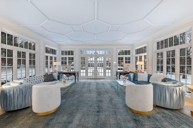 sunroom with coffered ceiling and french doors