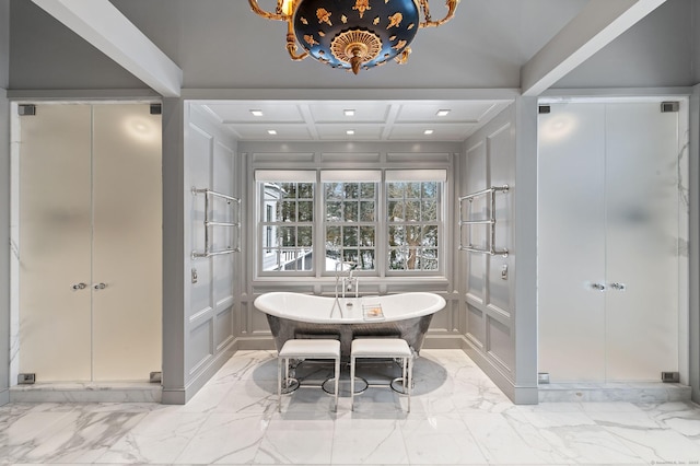 bathroom featuring beamed ceiling, coffered ceiling, and separate shower and tub