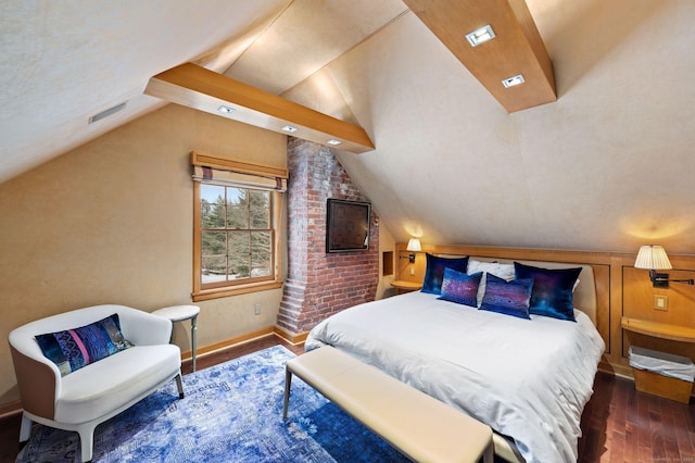 bedroom with dark wood-type flooring and lofted ceiling