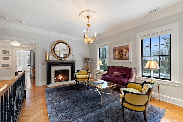 sitting room featuring an inviting chandelier, baseboards, crown molding, and visible vents