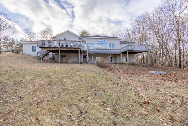 view of front of home featuring a wooden deck and a front yard