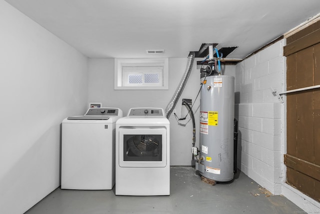 laundry area featuring separate washer and dryer and gas water heater