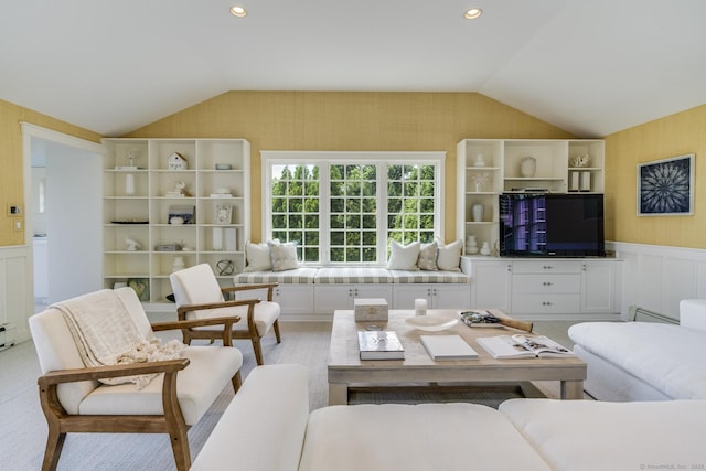 living room with vaulted ceiling