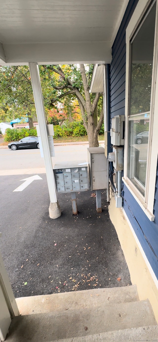 view of patio featuring mail area