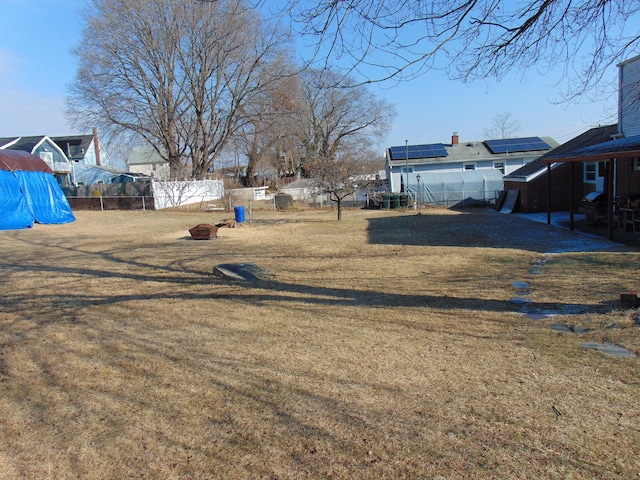 view of yard featuring an outdoor fire pit