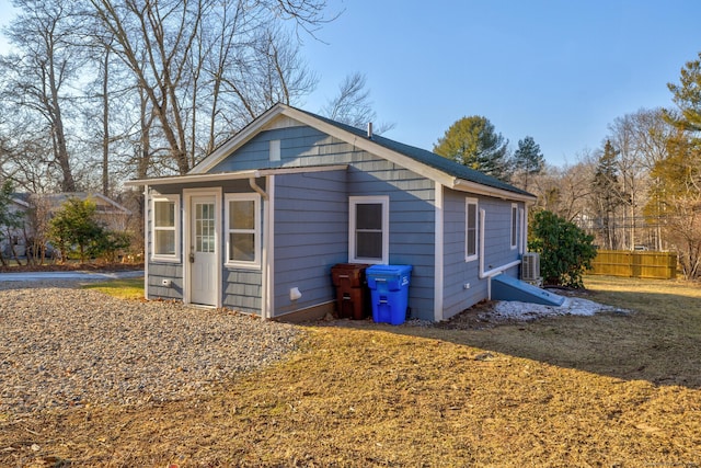 view of side of property with central AC unit