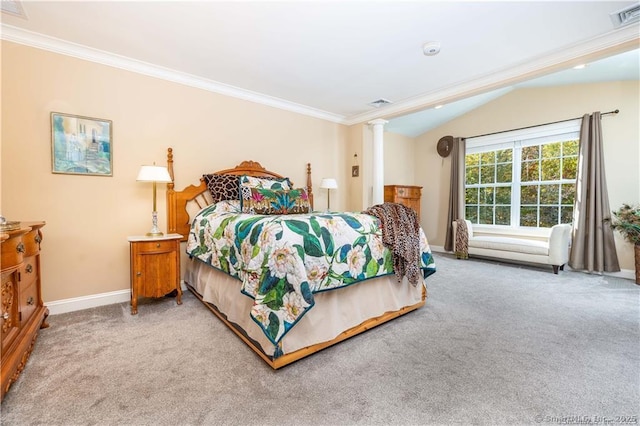 carpeted bedroom with vaulted ceiling, ornamental molding, and ornate columns