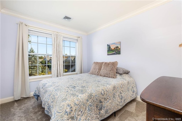 carpeted bedroom featuring crown molding