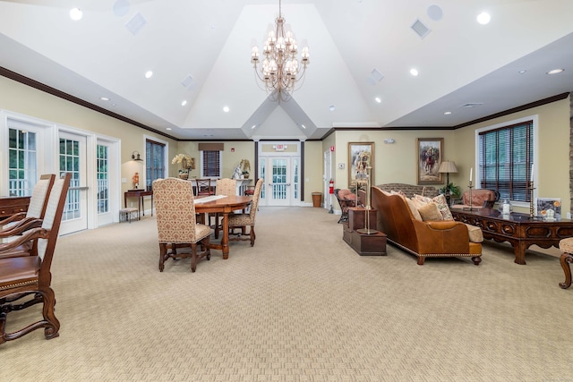 carpeted dining room featuring vaulted ceiling, crown molding, french doors, and an inviting chandelier