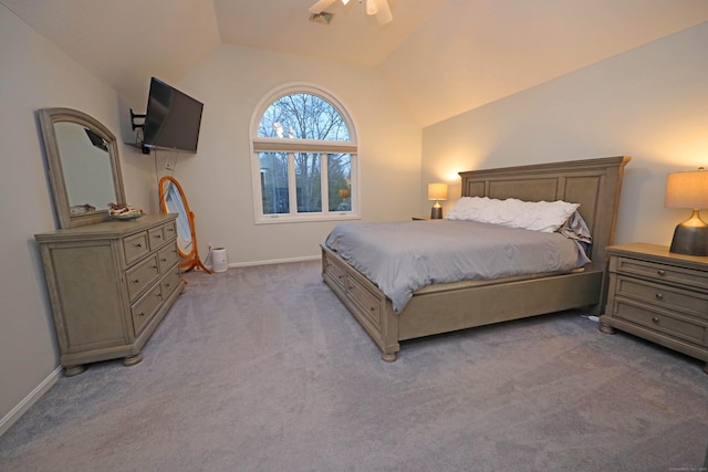 bedroom featuring ceiling fan, carpet, and lofted ceiling